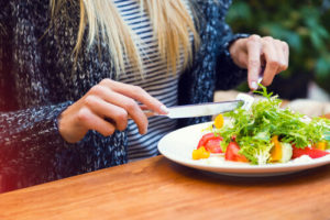 Woman eating healthy during recovery